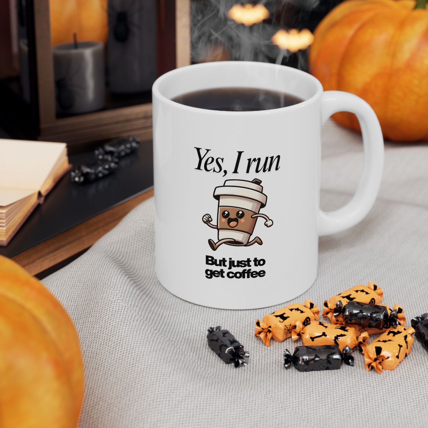 Funny runner mug with quote Yes I Run But Just to Get Coffee surrounded by Halloween candy and pumpkin decor