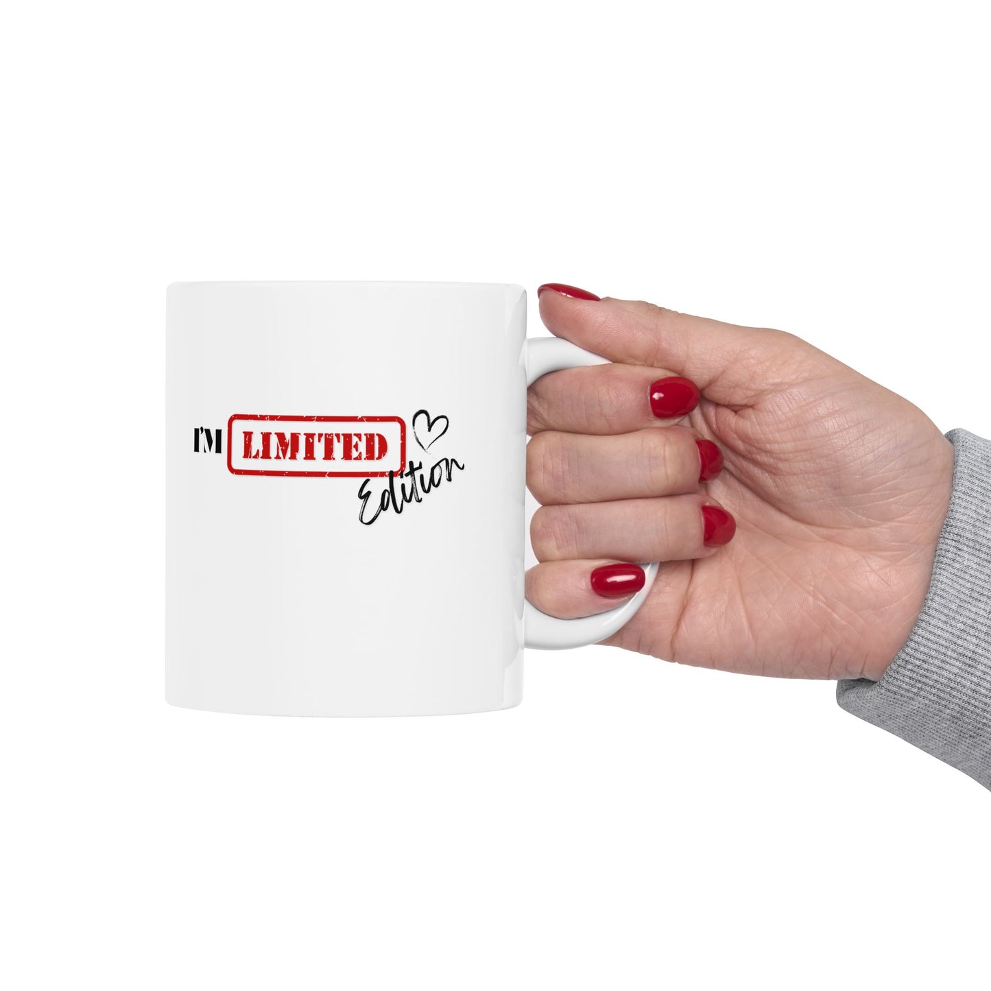 Close-up of hand holding “I’m Limited Edition” coffee mug – motivational gift with attitude