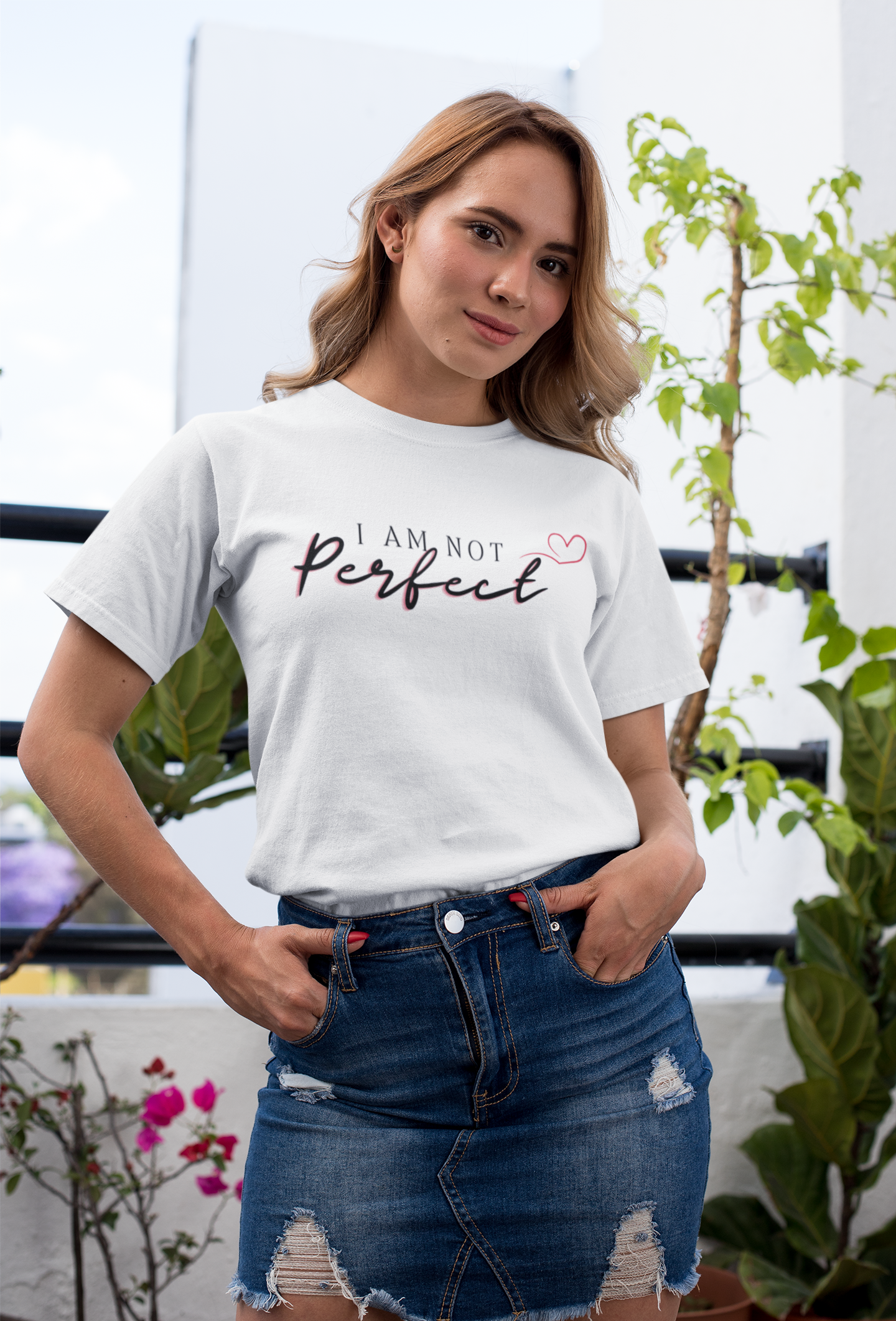Woman wearing “I Am Not Perfect” unisex t-shirt – casual streetwear look promoting self-love