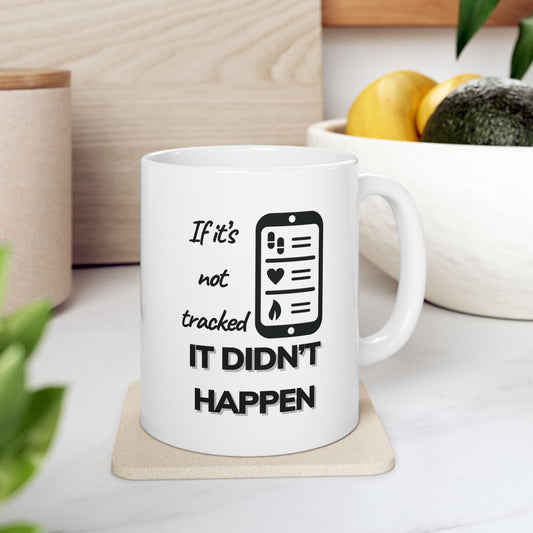 Funny fitness mug with bold workout quote next to lemon and greenery in a bright kitchen setup