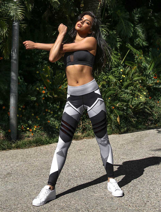 Gray and black high-waisted athletic leggings – compression style for fitness, running, and gym workouts