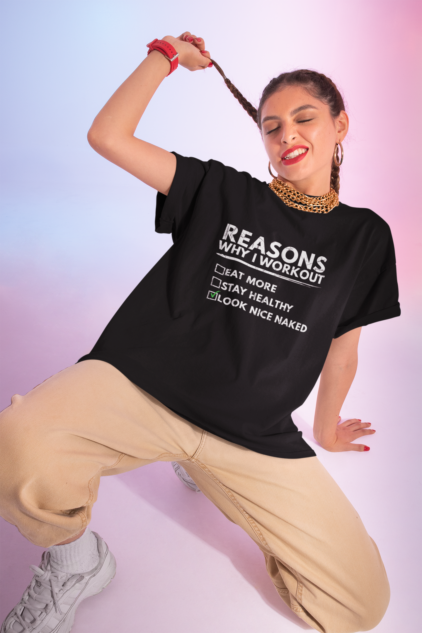 Woman wearing "Look Nice Naked" motivational workout t-shirt – bold and humorous fitness apparel for gym sessions