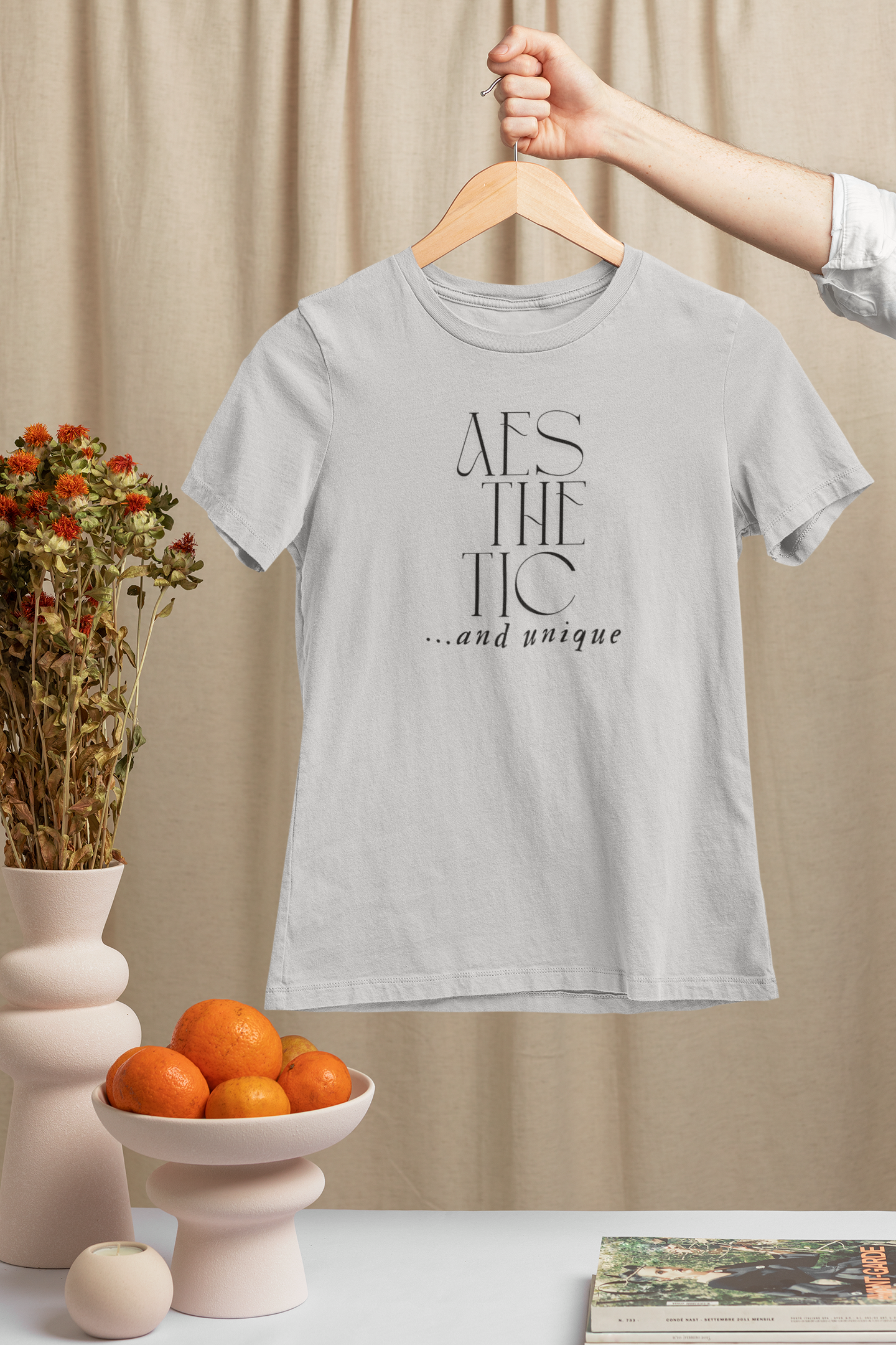 Gray minimalist gym shirt hanging with "Just Move" text – sleek fitness tee for aesthetic style lovers