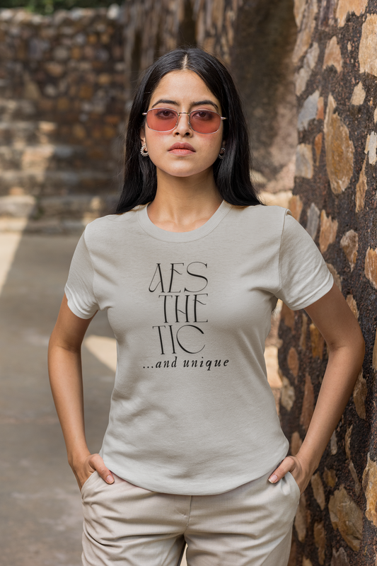 Woman wearing grey minimalist "Just Move" t-shirt – modern fitness shirt with clean aesthetic for gym or casual wear