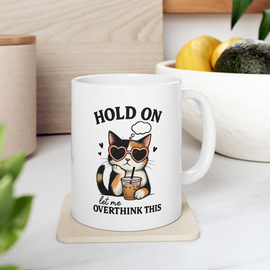 White ceramic mug with funny cat design – Hold On Let Me Overthink This