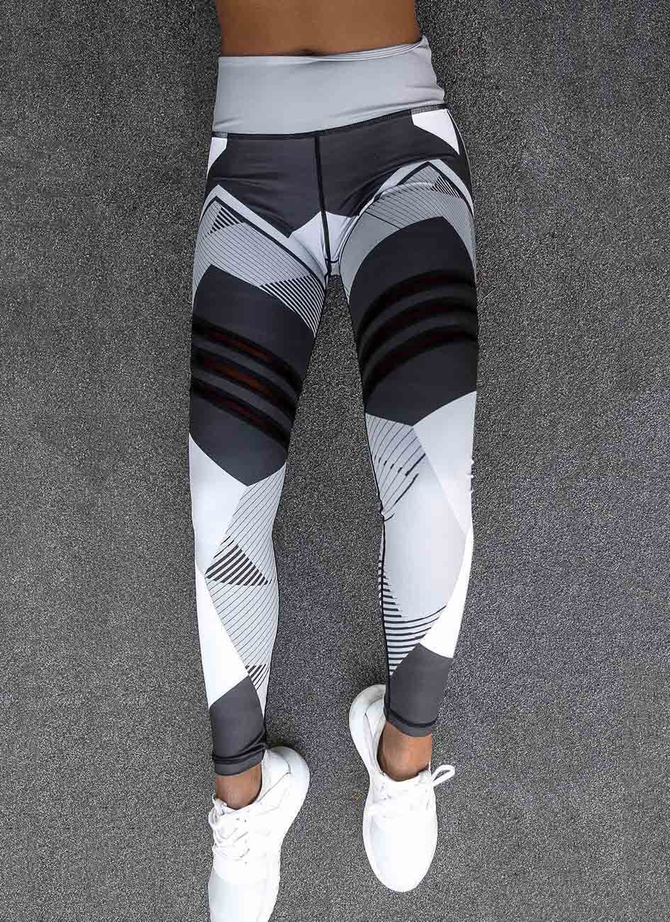 Gray and black compression leggings – tight fit and support for intense workouts and cardio