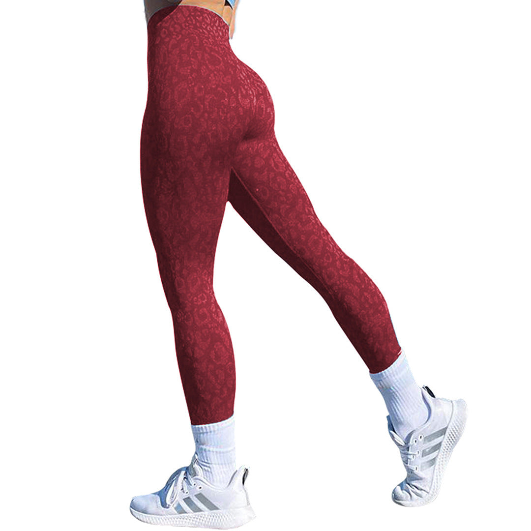 Side view of red high-rise leggings with glute contour design – breathable and stretchy