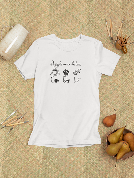 White t-shirt with the phrase “A simple woman who loves coffee, dogs, lift” laid flat on neutral background – gym shirt for dog moms and coffee lovers