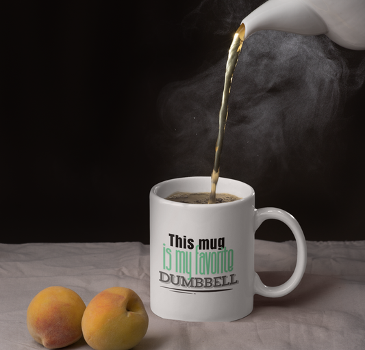 Hot coffee being poured into a gym-themed mug – funny dumbbell coffee cup for weightlifters and fitness fans