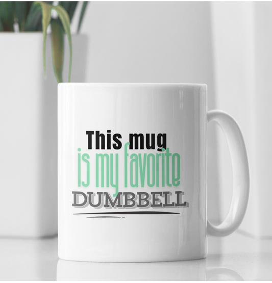 White ceramic mug with the text "This Mug Is My Favorite Dumbbell" – minimalist fitness gift for gym and coffee lovers