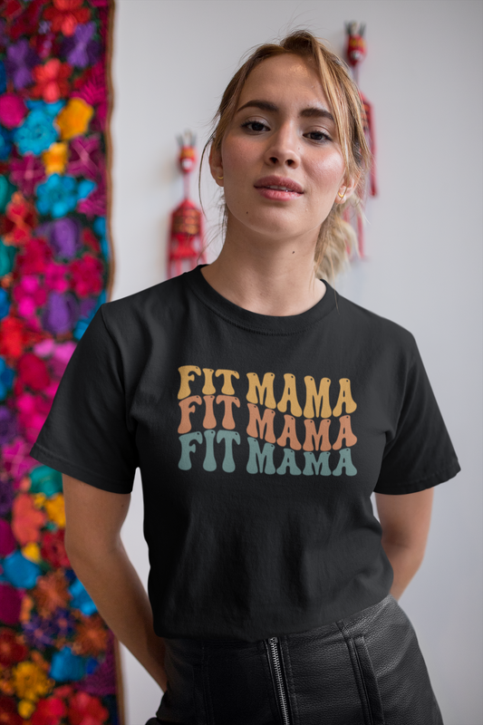 Woman in black Fit Mama t-shirt posing outdoors – retro workout shirt for moms.