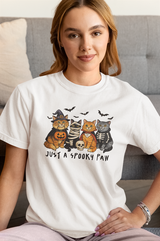 Model wearing Just a Spooky Paw Halloween Cat T-Shirt in white color