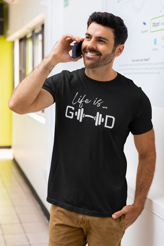 Man wearing black gym t-shirt with barbell design and phrase “Life is Good,” workout apparel.