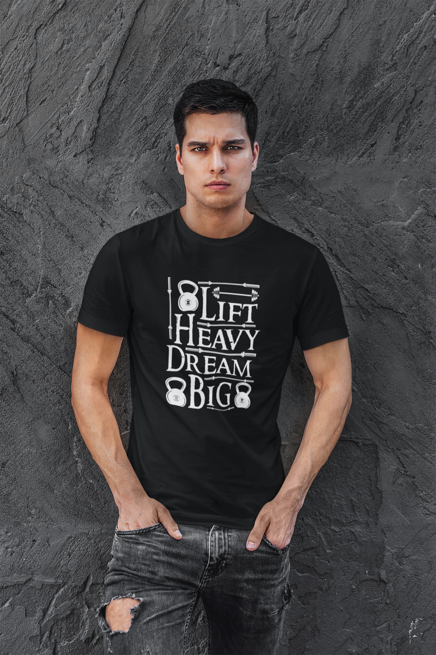 Man modeling black Lift Heavy Dream Big t-shirt for workouts.