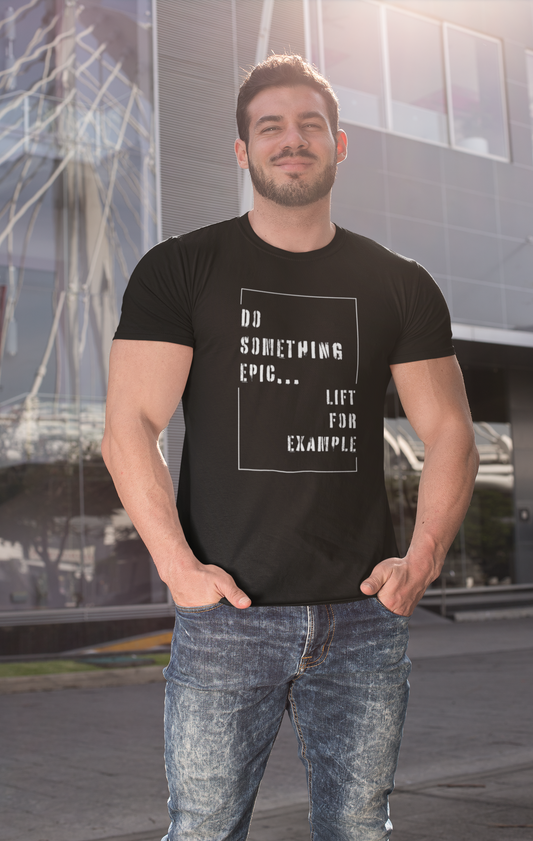 Man wearing black gym shirt with "Do Something Epic – Lift For Example" motivational quote – perfect for lifters and activewear