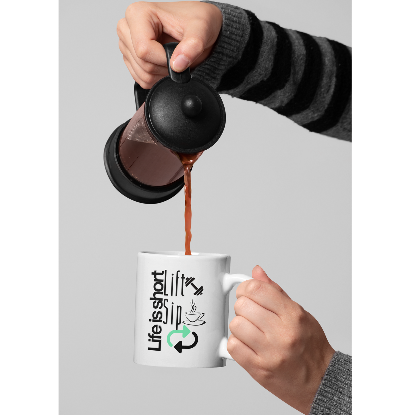 Coffee being poured into a motivational gym mug – "Life Is Short Lift Sip" design on white 11oz cup