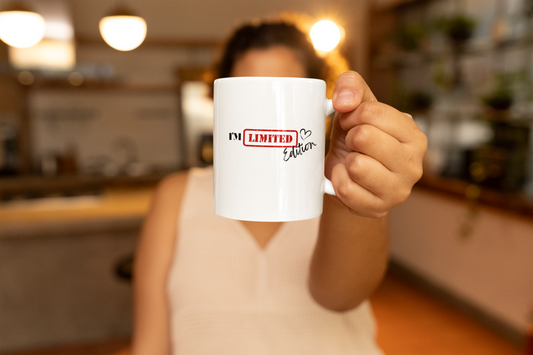 Woman holding “I’m Limited Edition” ceramic mug – empowering and stylish coffee moment
