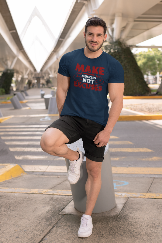 Athletic man running in navy blue workout t-shirt that says “Make Muscles Not Excuses,” motivational fitness shirt.