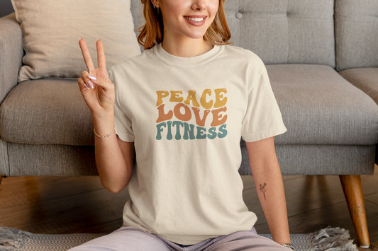 Woman wearing beige Peace Love Fitness T-Shirt – casual fitness clothing.