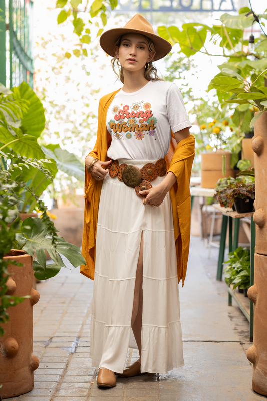 Woman outdoors wearing beige Strong Woman T-shirt – retro floral empowerment tee