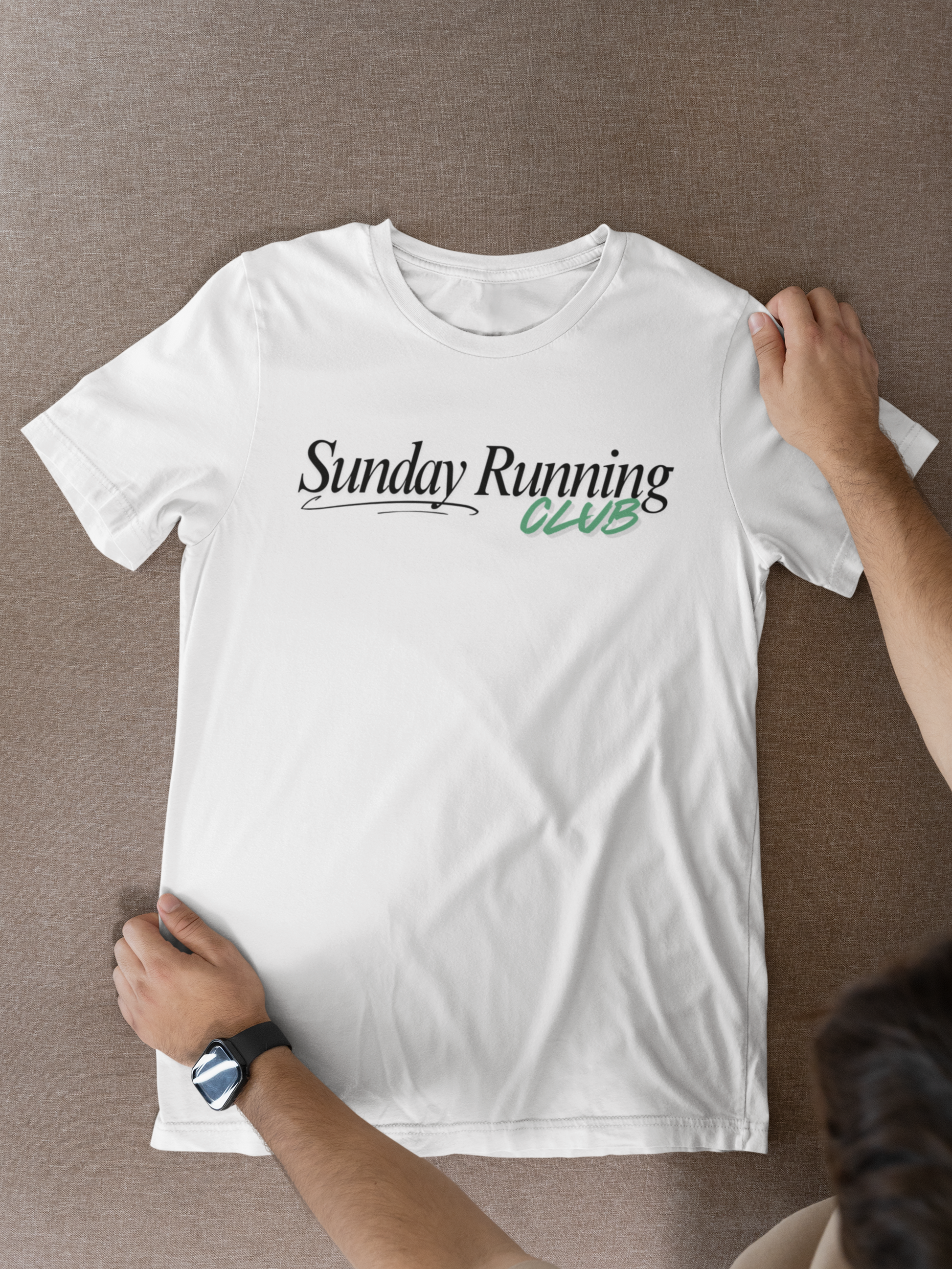 Person holding white Sunday Running Club T-shirt – unisex running shirt for runners and joggers