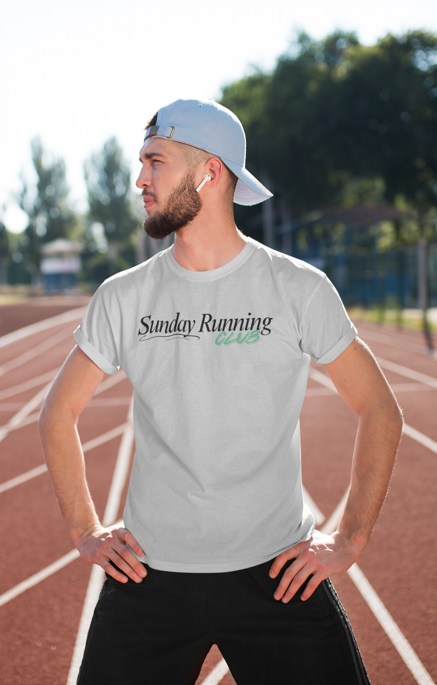 Man wearing gray Sunday Running Club T-shirt – ideal for running and fitness